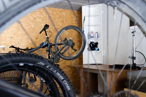 a bike is leaning up against a wall at Apart Austria in Nauders