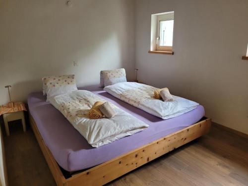 Postel nebo postele na pokoji v ubytování Ristoro Buril