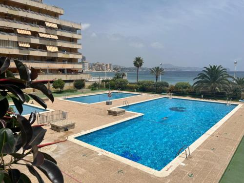 Calpe apartamento 1a linea de playa piscina reformado wifi aire