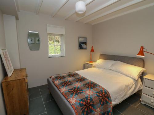 Postel nebo postele na pokoji v ubytování Pen y Mynydd