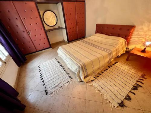 Postel nebo postele na pokoji v ubytování La maisonnette