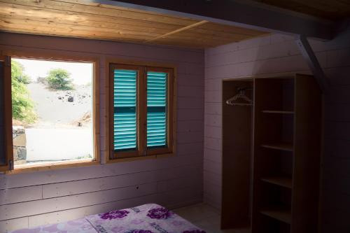 Una cama o camas en una habitación de Casa Madeira