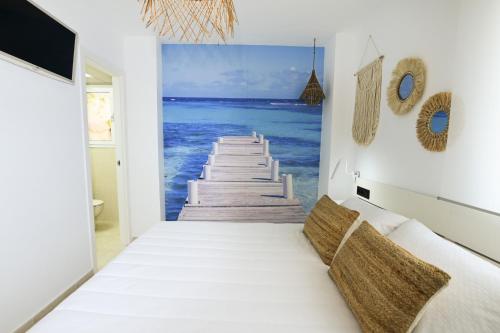 A bed or beds in a room at Edificio Amatista