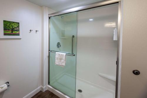 a shower with a glass door in a bathroom at Hampton Inn Columbia I-26/Harbison Blvd in Columbia