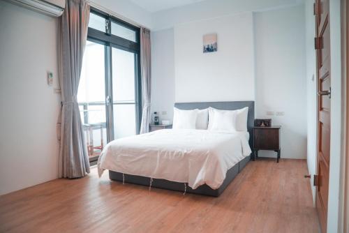Cama o camas de una habitación en 礁溪夜室