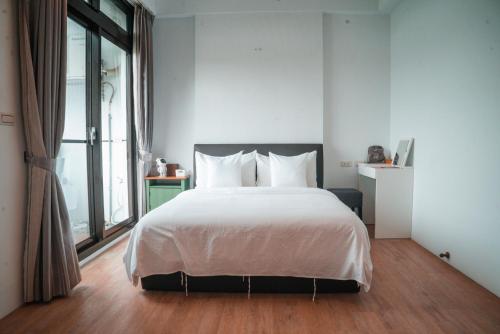 Cama o camas de una habitación en 礁溪夜室