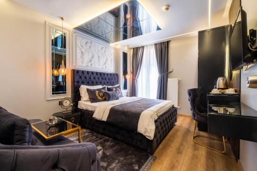 A bed or beds in a room at Wind Suit