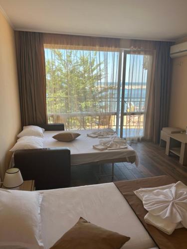 A bed or beds in a room at Villa Maria 2