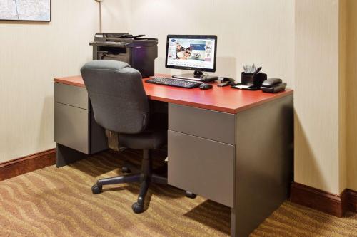 an office with a desk with a computer on it at Hampton Inn Clifton Park in Clifton Park