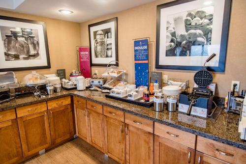 a kitchen with a counter top with many items on it at Hampton Inn Caryville-I-75/Cove Lake-State Park in Caryville
