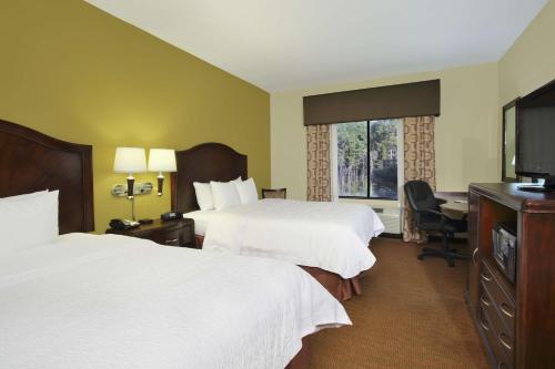 Postel nebo postele na pokoji v ubytování Hampton Inn & Suites Conroe I 45 North
