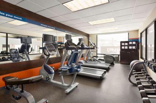 a gym with treadmills and elliptical machines at Hampton Inn Denver-West/Golden in Golden
