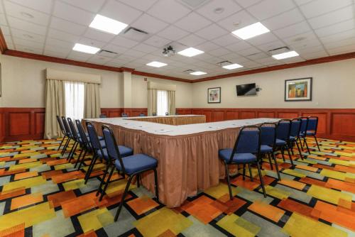 a large conference room with chairs and a large table at Hampton Inn & Suites Detroit/Chesterfield in Chesterfield