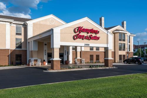 a christmasmas sign on the front of a building at Hampton Inn & Suites Florence Center in Florence