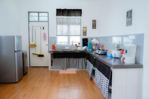 Kuchyň nebo kuchyňský kout v ubytování COZY HOMESTAY