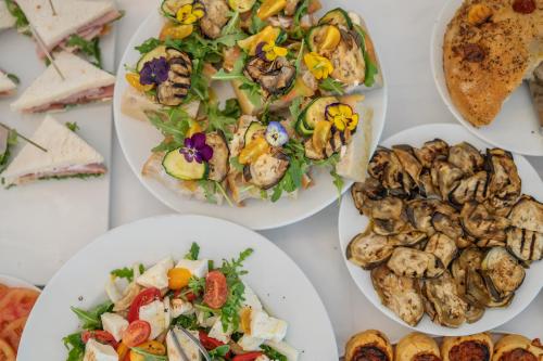 a table with three plates of food on it at Albergo Miramare Positano in Positano