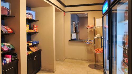 a walk in pantry with a refrigerator in a room at Hampton Inn Gadsden/Attalla Interstate 59 in Gadsden