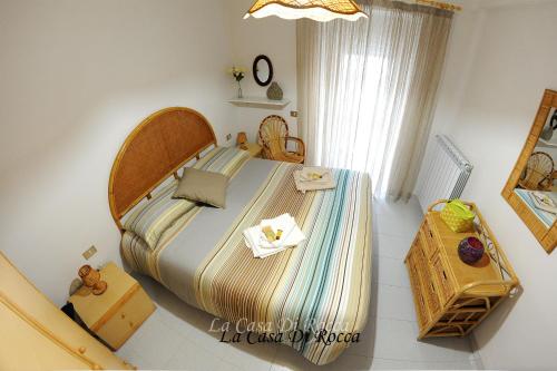 a bedroom with a large bed in a room at La Casa di Rocca in Castel di Sangro