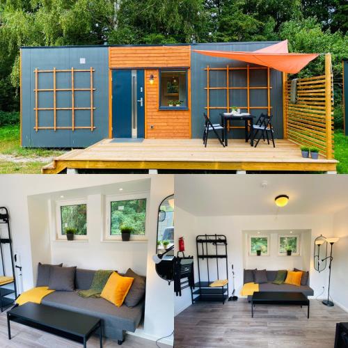 een tiny house met een woonkamer en een patio bij Lomma Camping in Lomma