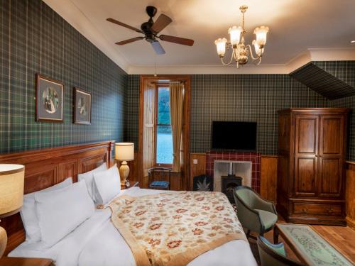 Katil atau katil-katil dalam bilik di The Whispering Pine Lodge