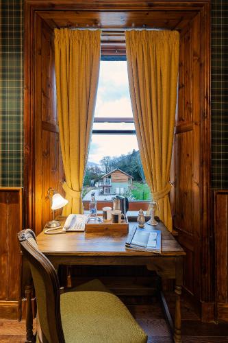 Gambar di galeri bagi The Whispering Pine Lodge di Letterfinlay