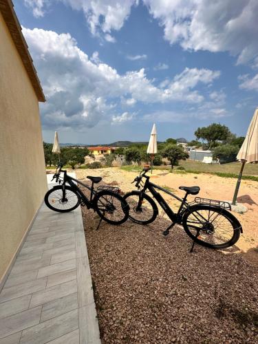 a group of bikes parked next to a building at Molti Mari B&B Resort in Olbia