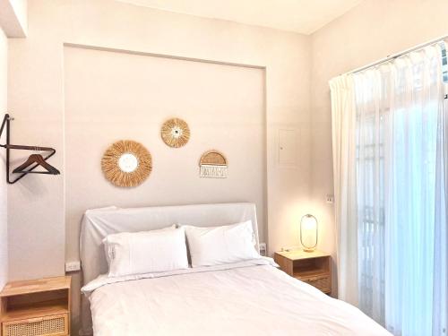 Postel nebo postele na pokoji v ubytování Brother Homestay