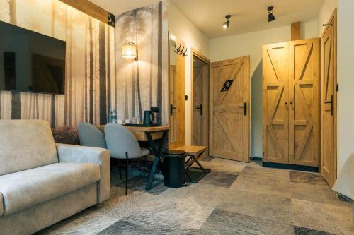 Posezení v ubytování Sztygarka Hetmańska Resort Solina