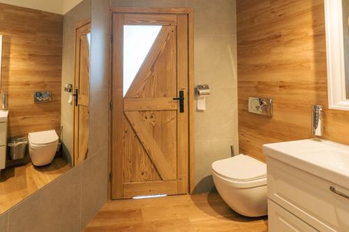 Koupelna v ubytování Sztygarka Hetmańska Resort Solina
