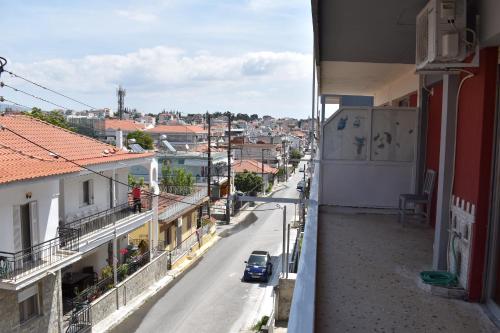 a view of a city street from a building at Giorgos house in Nea Kalikratia