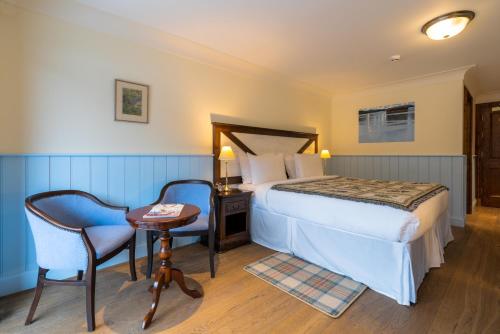 Katil atau katil-katil dalam bilik di The Whispering Pine Lodge