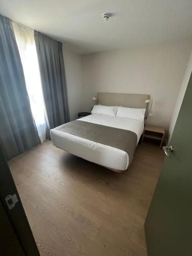 Postel nebo postele na pokoji v ubytování Hotel H4 Cangas 3 Superior