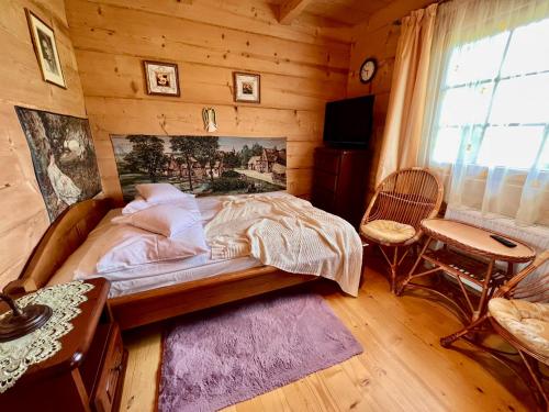 Letto o letti in una camera di Willa Pod Niebem