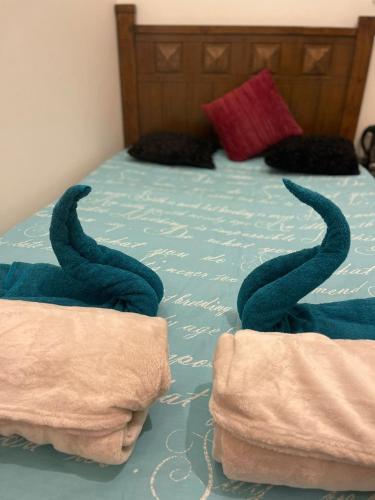 Postel nebo postele na pokoji v ubytování Corniche, Abu Dhabi