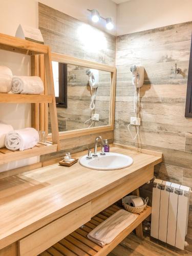Ванная комната в Senderos Aparts & Suites