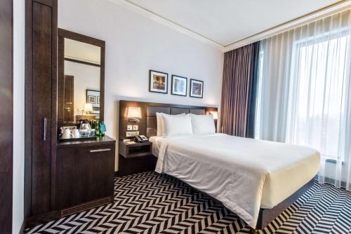 Katil atau katil-katil dalam bilik di Hilton Garden Inn Krakow Airport