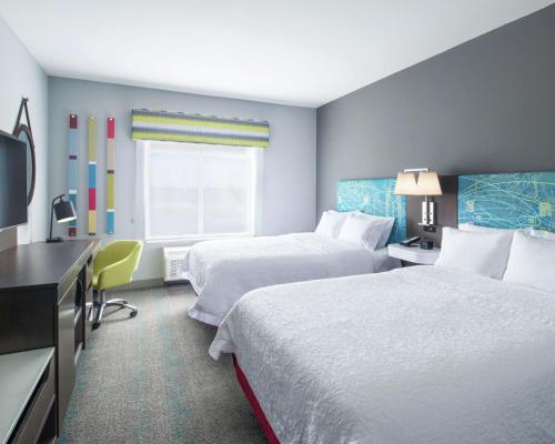Ένα ή περισσότερα κρεβάτια σε δωμάτιο στο Hampton Inn & Suites Lubbock