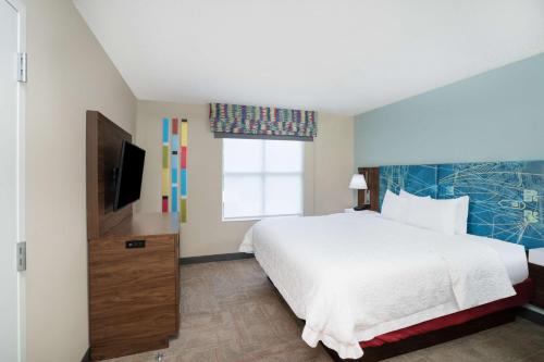 Ένα ή περισσότερα κρεβάτια σε δωμάτιο στο Hampton Inn & Suites West Little Rock