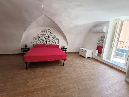 En eller flere senge i et værelse på La Volta di Gatto