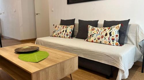 Una cama o camas en una habitación de Gades de la Caleta con Terraza Grupo AC Gestion