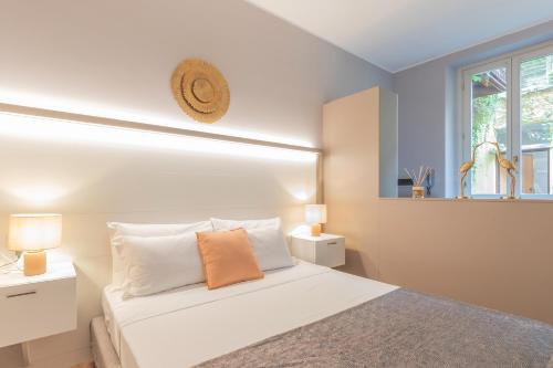 Una cama o camas en una habitación de Milan Retreats Duomo