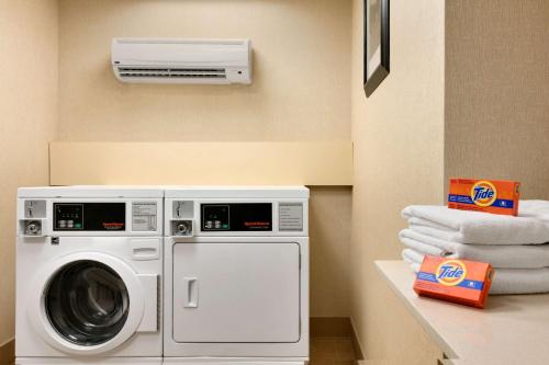 a laundry room with a washer and dryer at Hampton Inn & Suites Mahwah in Mahwah