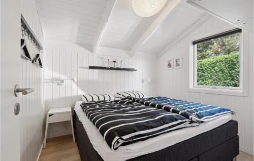 Postel nebo postele na pokoji v ubytování Amazing Home In Tarm With Kitchen