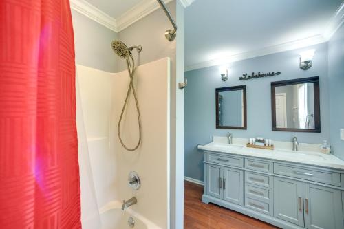 a bathroom with a shower and a sink at Guntersville Lake House Dock and Boat Ramp Access! in Scottsboro
