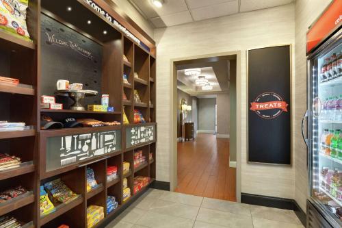 a grocery store aisle with food items on shelves at Hampton Inn & Suites Montgomery-EastChase in Montgomery