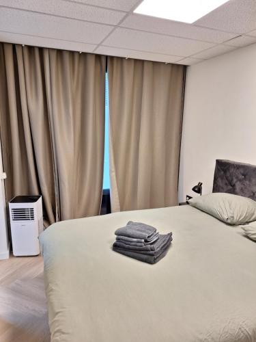Ένα ή περισσότερα κρεβάτια σε δωμάτιο στο Perfect studio 14 H center Rotterdam