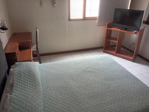 TV a/nebo společenská místnost v ubytování LA SIESTA-Hotel