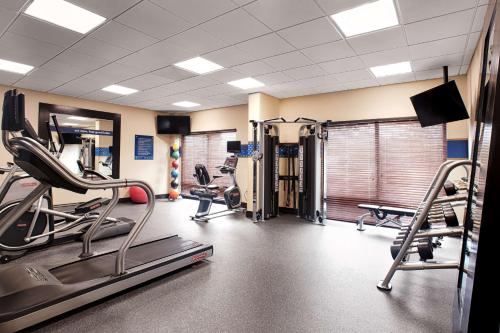 a gym with treadmills and machines in a room at Hampton Inn Morganton in Morganton