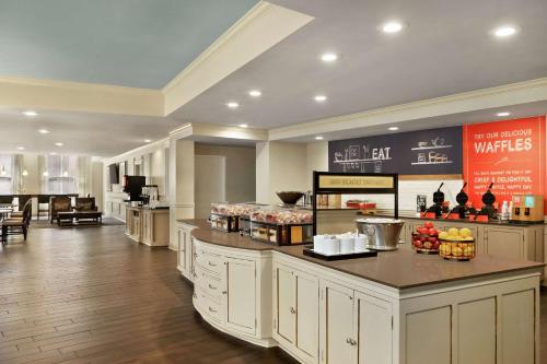 a kitchen with a counter with food on it at Hampton Inn Downtown / French Quarter Area in New Orleans