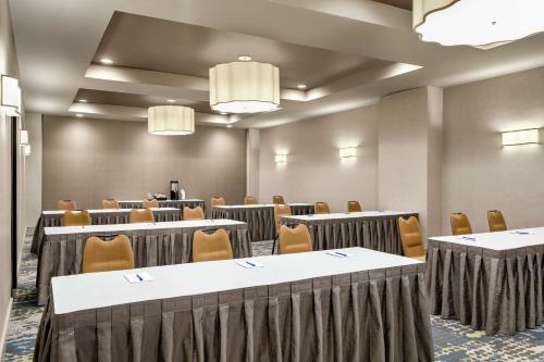 a conference room with tables and chairs in it at Hampton Inn Downtown / French Quarter Area in New Orleans